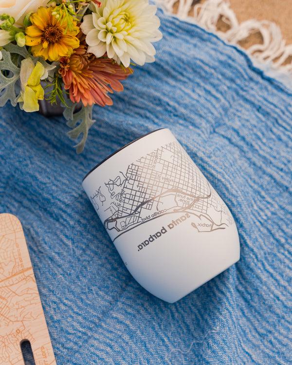 Santa Barbara Map Wine Tumbler Cup on a beach blanket